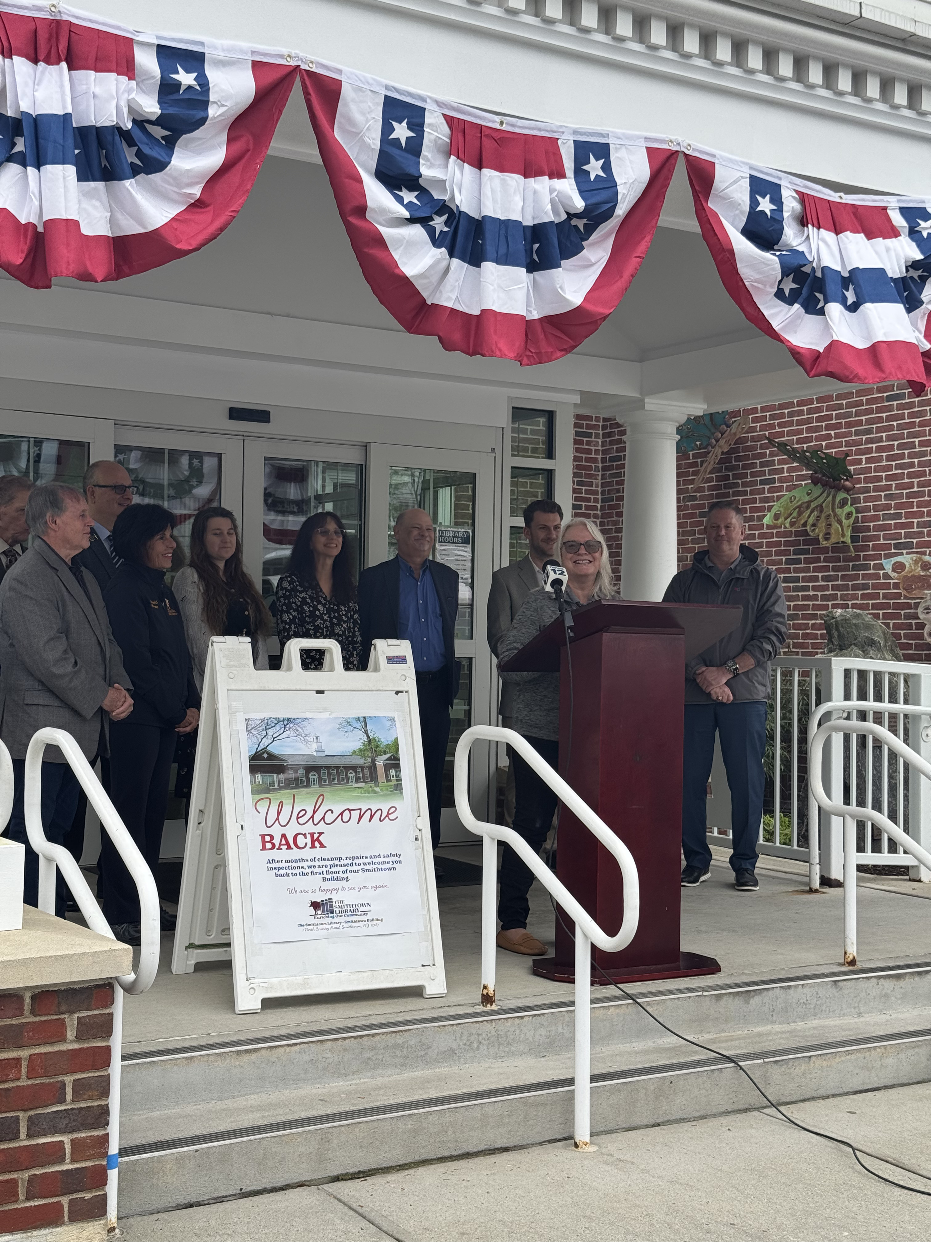 Assistant Library Director addressing the crowd