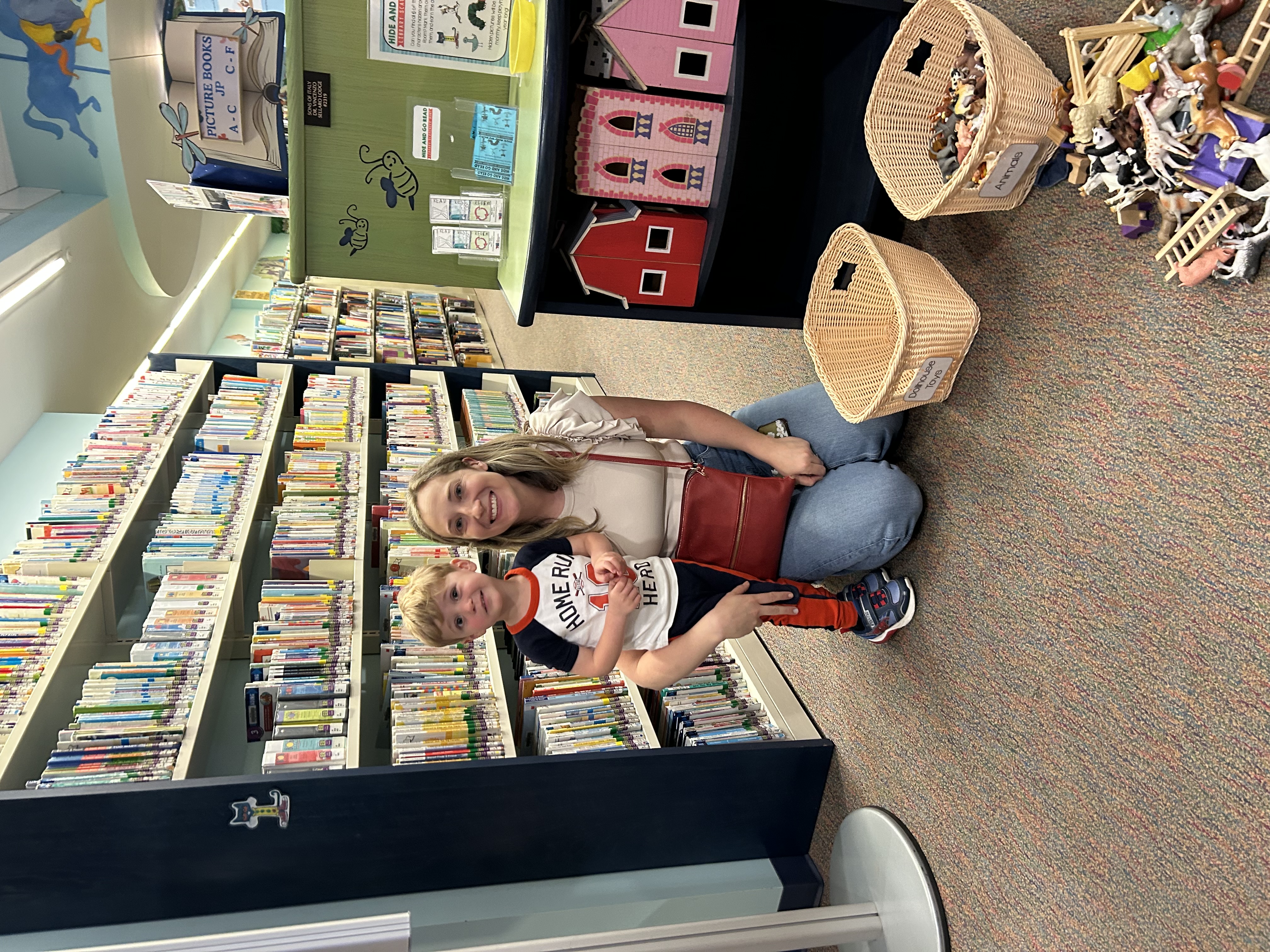 child and mom playing