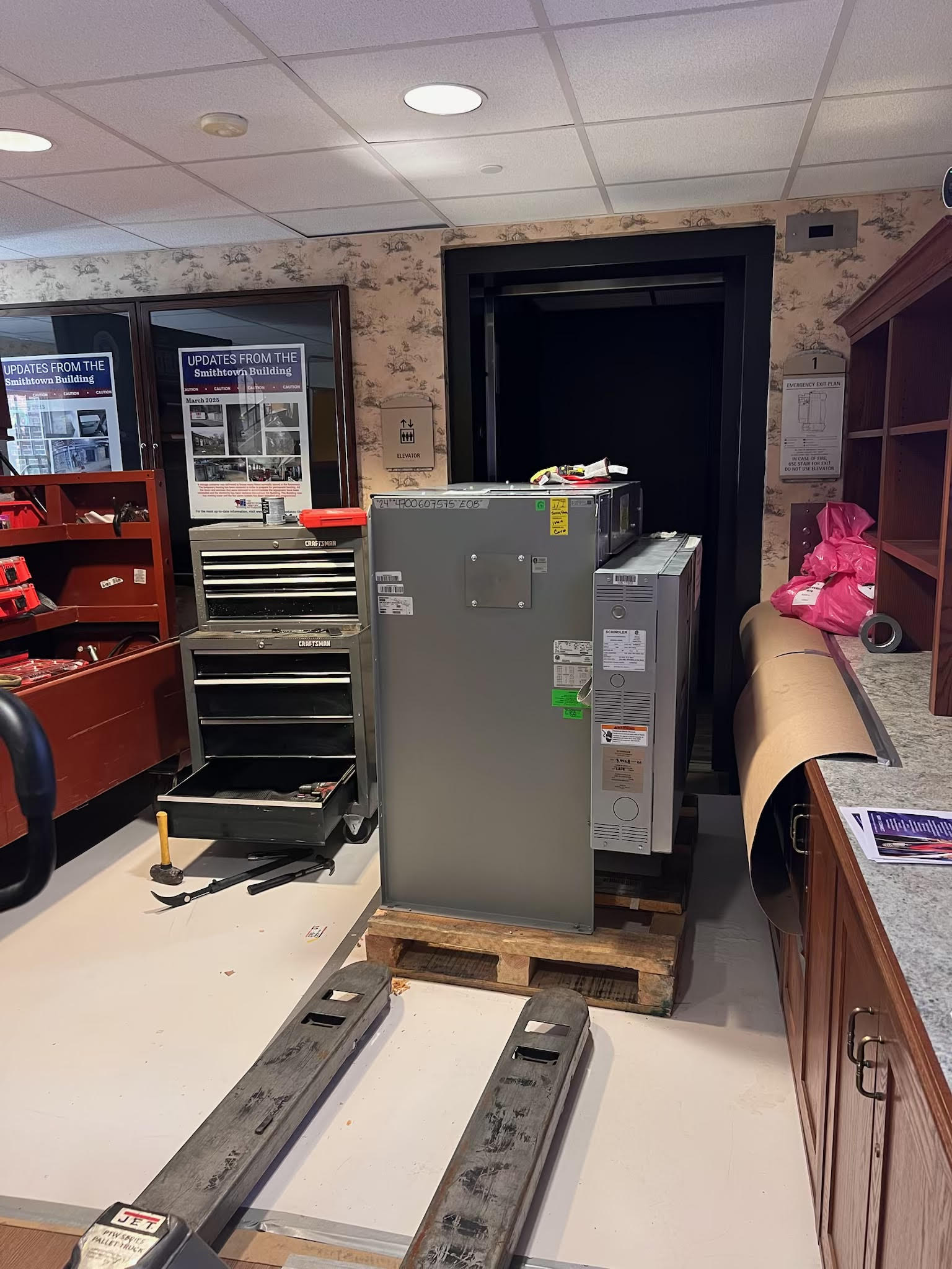 metal elevator parts being loaded