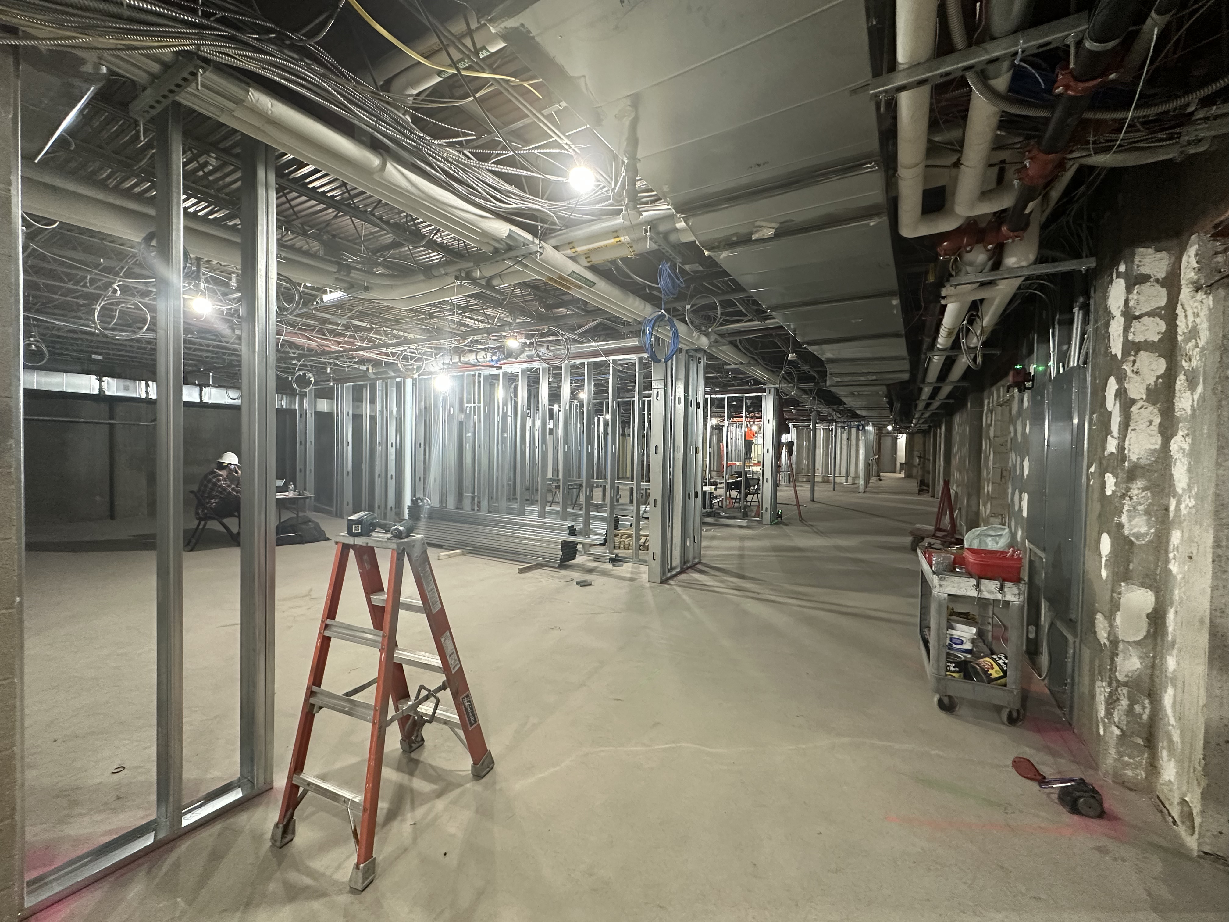 large concrete basement with metal framing