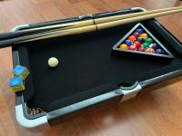 table top pool table with black felt 