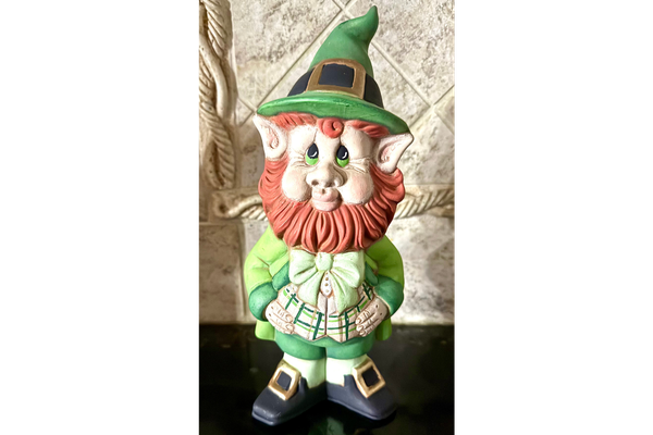 Ceramic Leprechaun figurine.